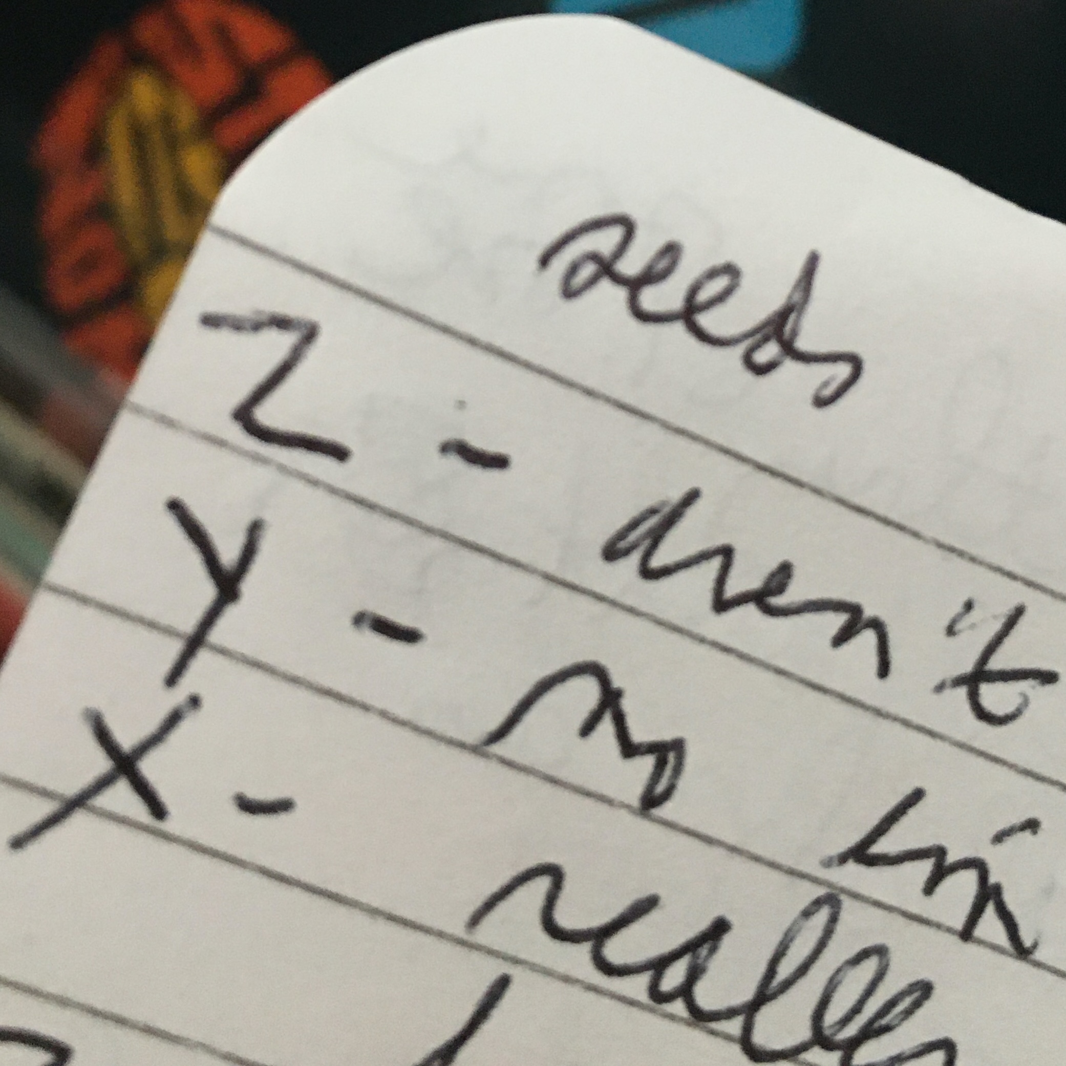 A corner of notebook paper with the beginnings of a handwritten script. At the top reads the word: seeds